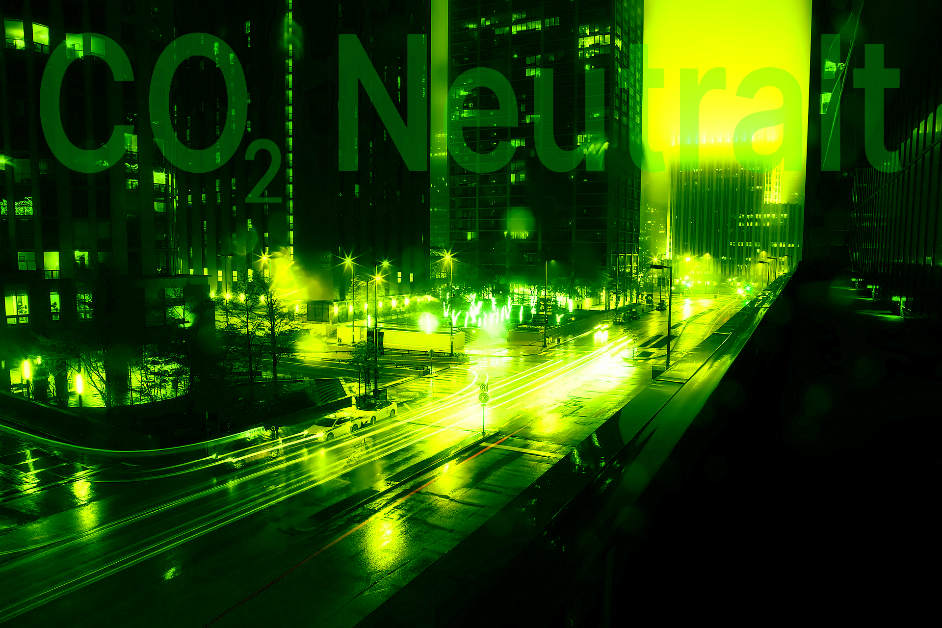 Grönstad i mörker med texten co2 neutralt